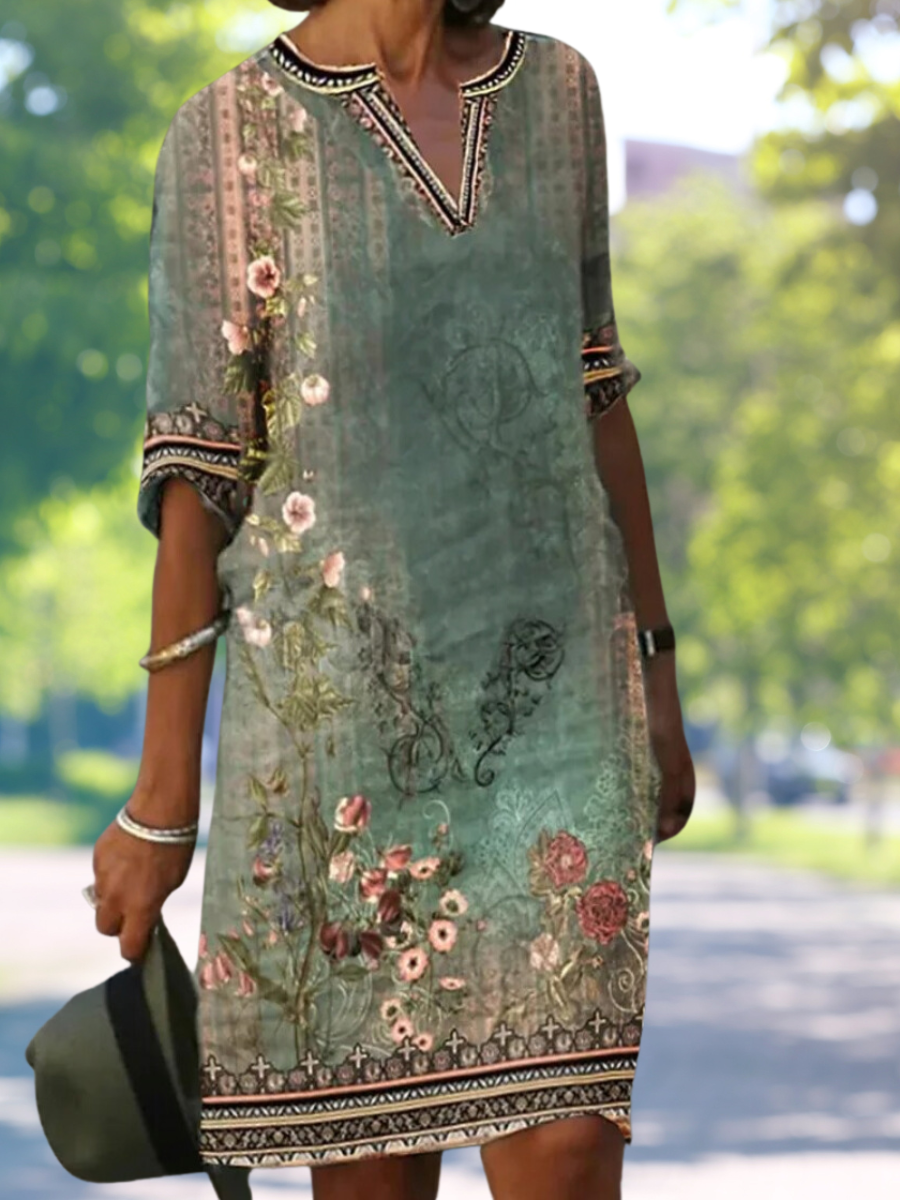 LD | Groene midi-jurk met V-hals en bloemenpatroon