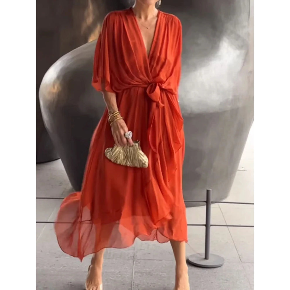 LD | Vrouwelijke jurk met gekruiste halslijn en vloeiende snit voor een geraffineerde look
