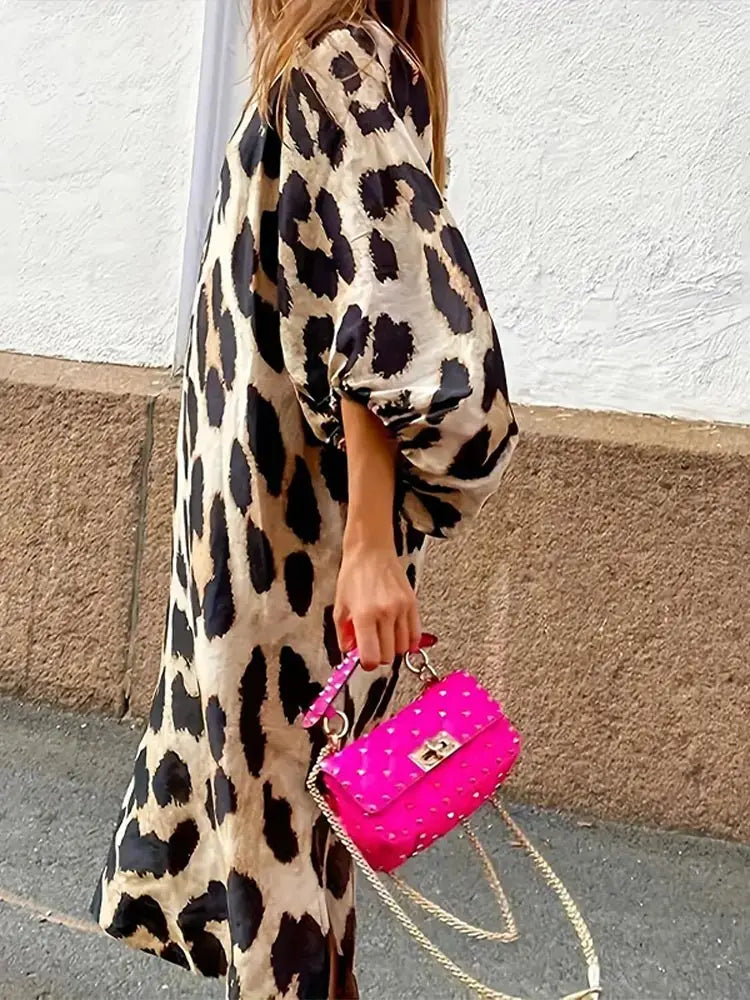 LD | Midi-jurk met luipaardprint en driekwart mouwen