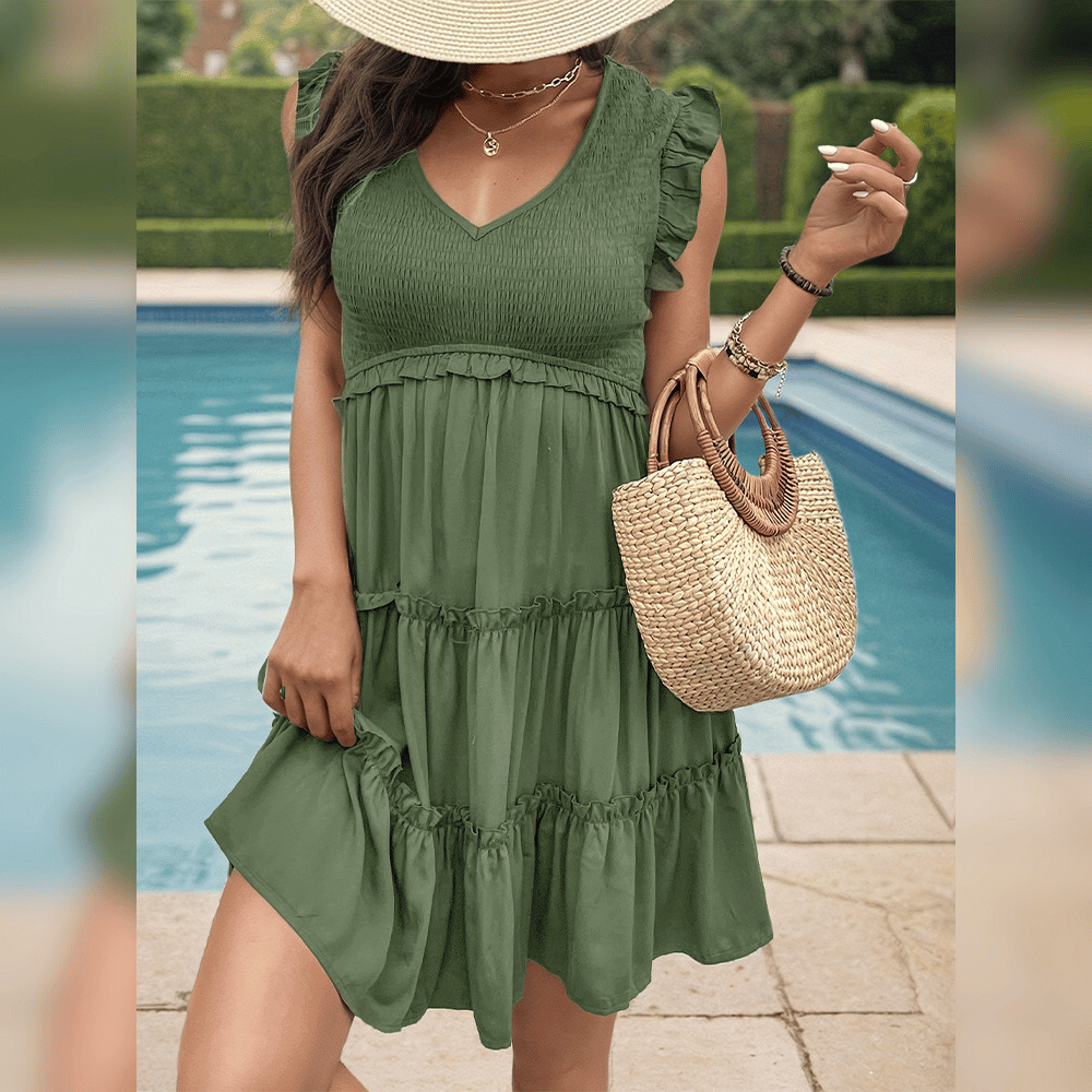 LD | Relaxed groen mini-jurkje met stroken voor je zomervakantie