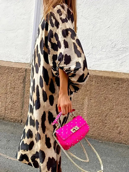 LD | Midi-jurk met luipaardprint en driekwart mouwen