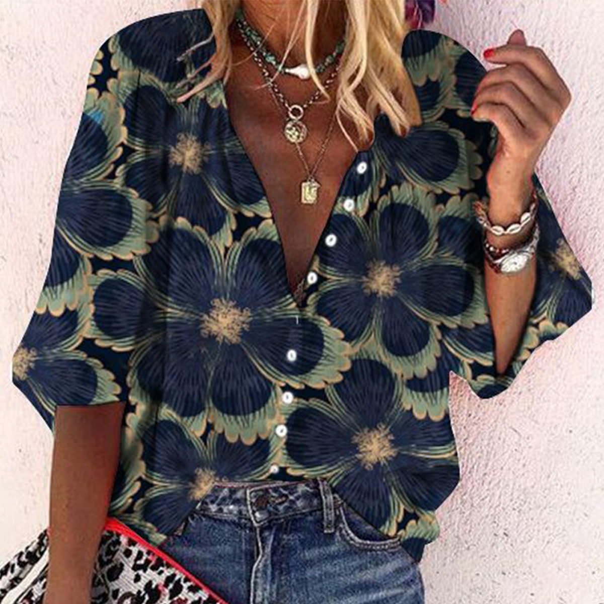 LD | Marineblauwe top met 3/4 mouwen en bloemenprint