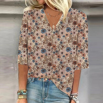 LD | blouse met 3/4 mouwen en bedrukte V-hals